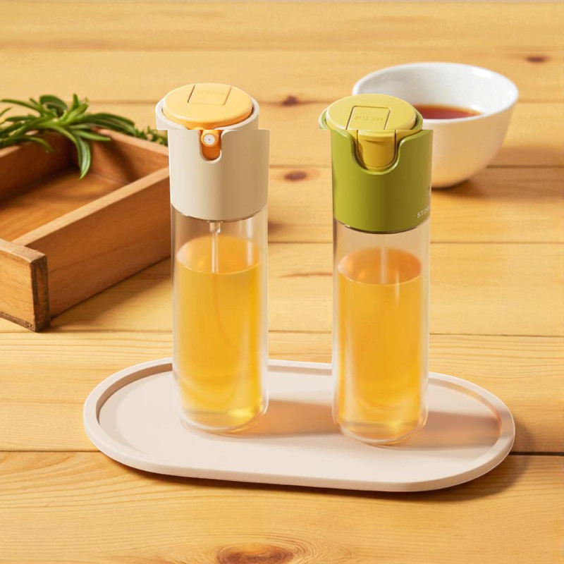 2-in-1 Glass Oil Bottle – Spray & Pour with Automatic Lid | Kitchen Essential by adornia.pk