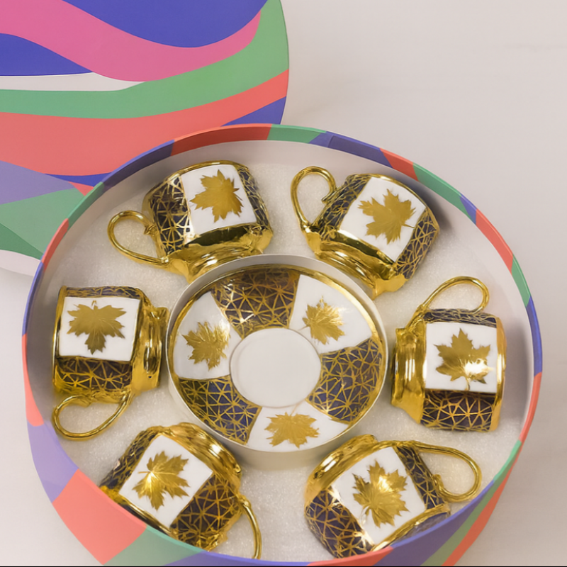 Elegant Coffee Cup & Saucer Set with Gold Maple Leaf Design